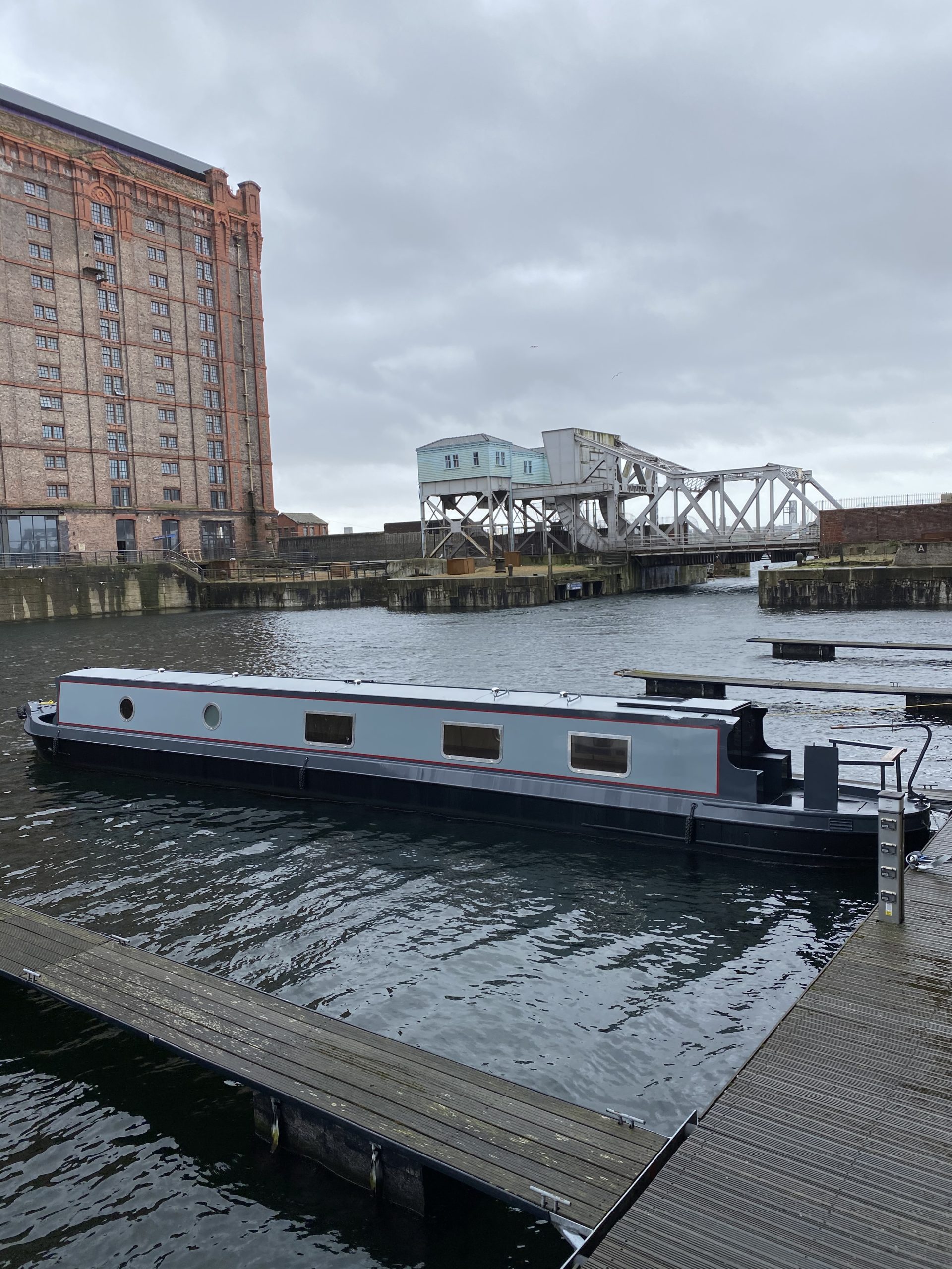 canal boat moored in a city