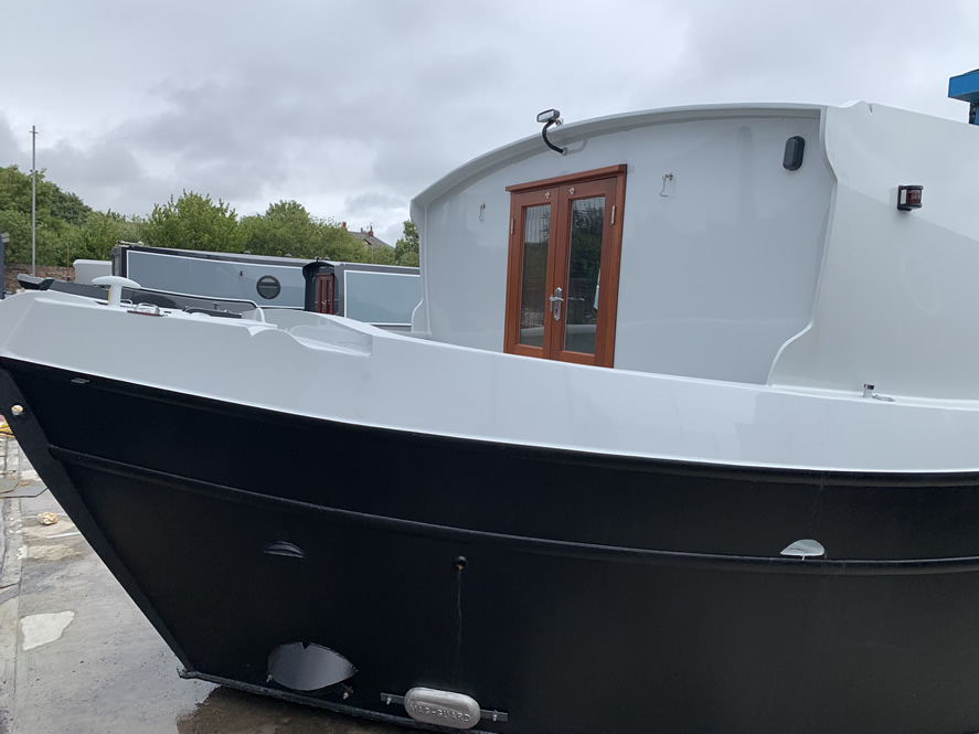 Widebeam canal boat prow