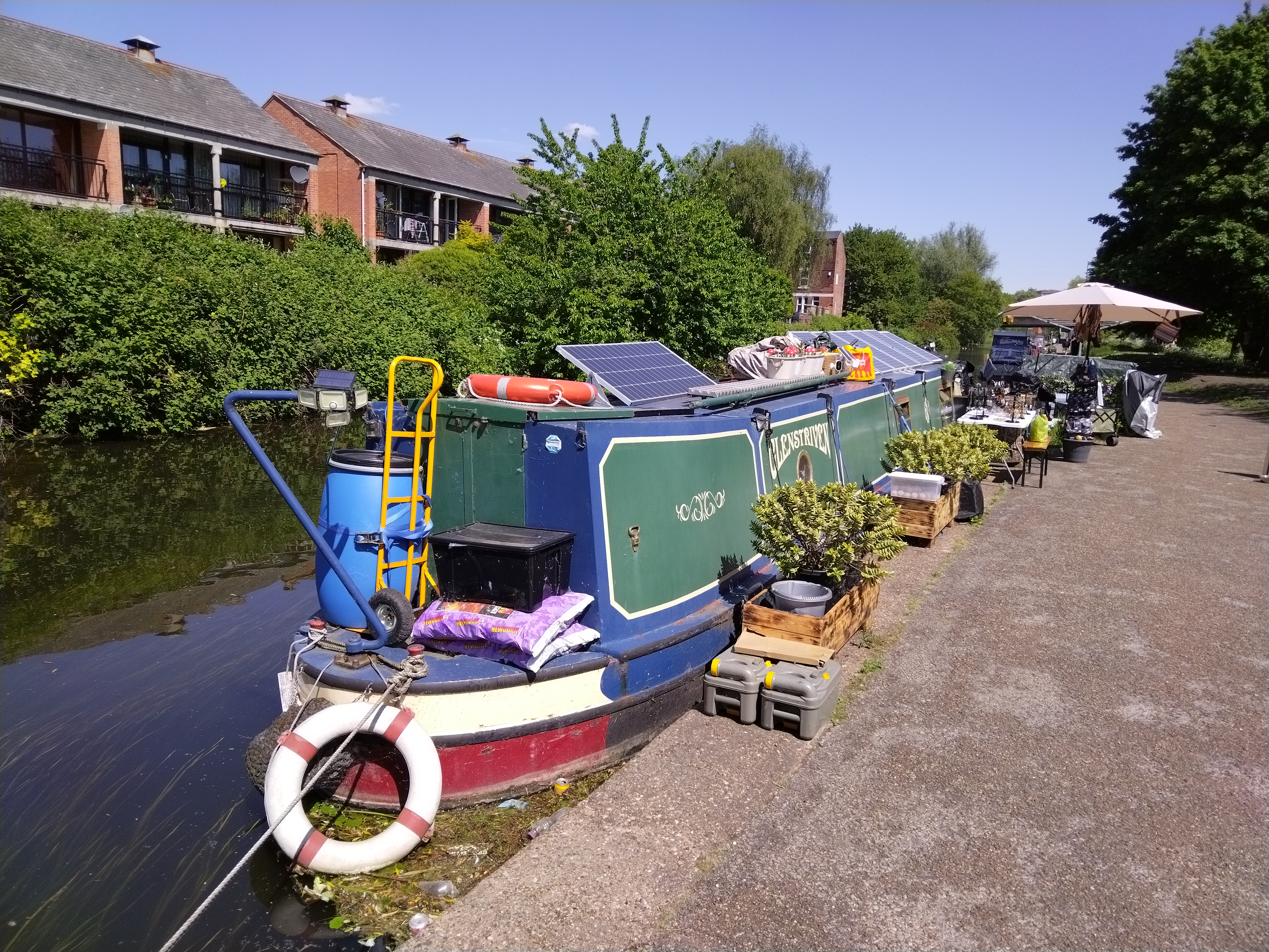 green canal boat with flowers on nottingham canal